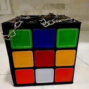 Rubik’s Cube Lacquered Faux Leather Chain Handle Handbag. 5.75” on each side.